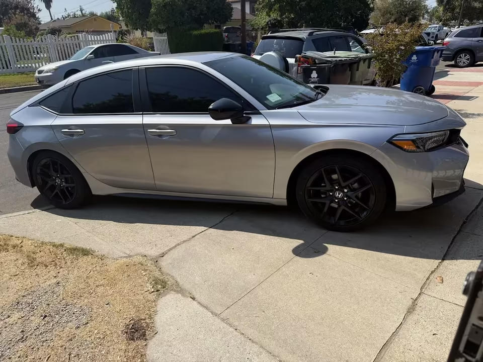 Silver Honda Civic with tinted windows